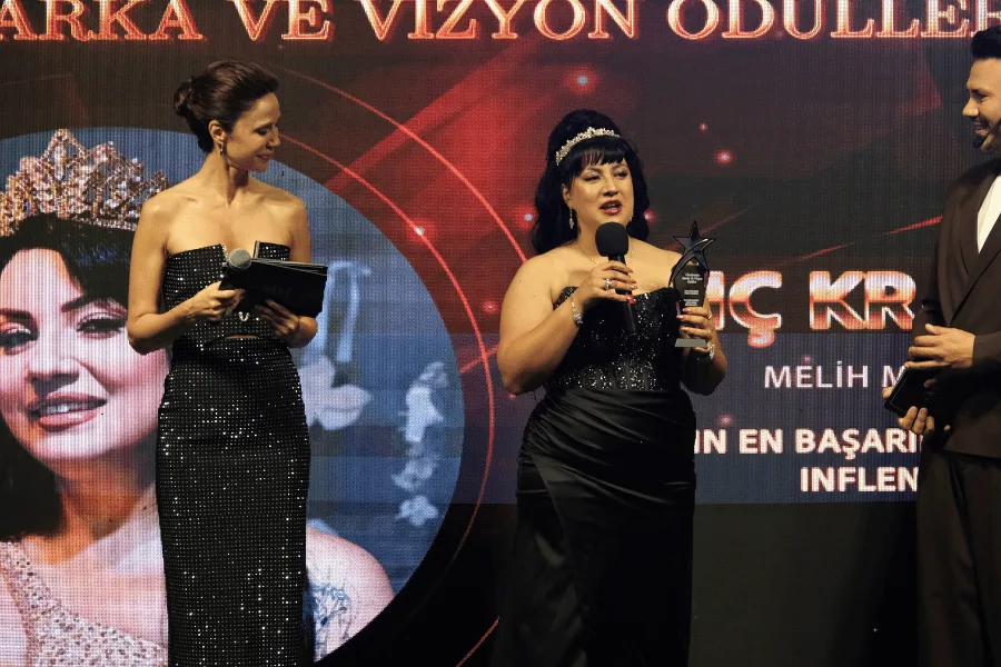 Brand of the year award being presented on stage